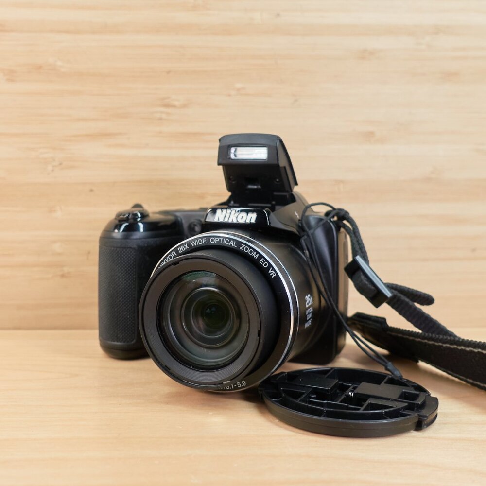 The Nikon Coolpix L330 is a vintage-style 20.2MP digital camera featuring a powe